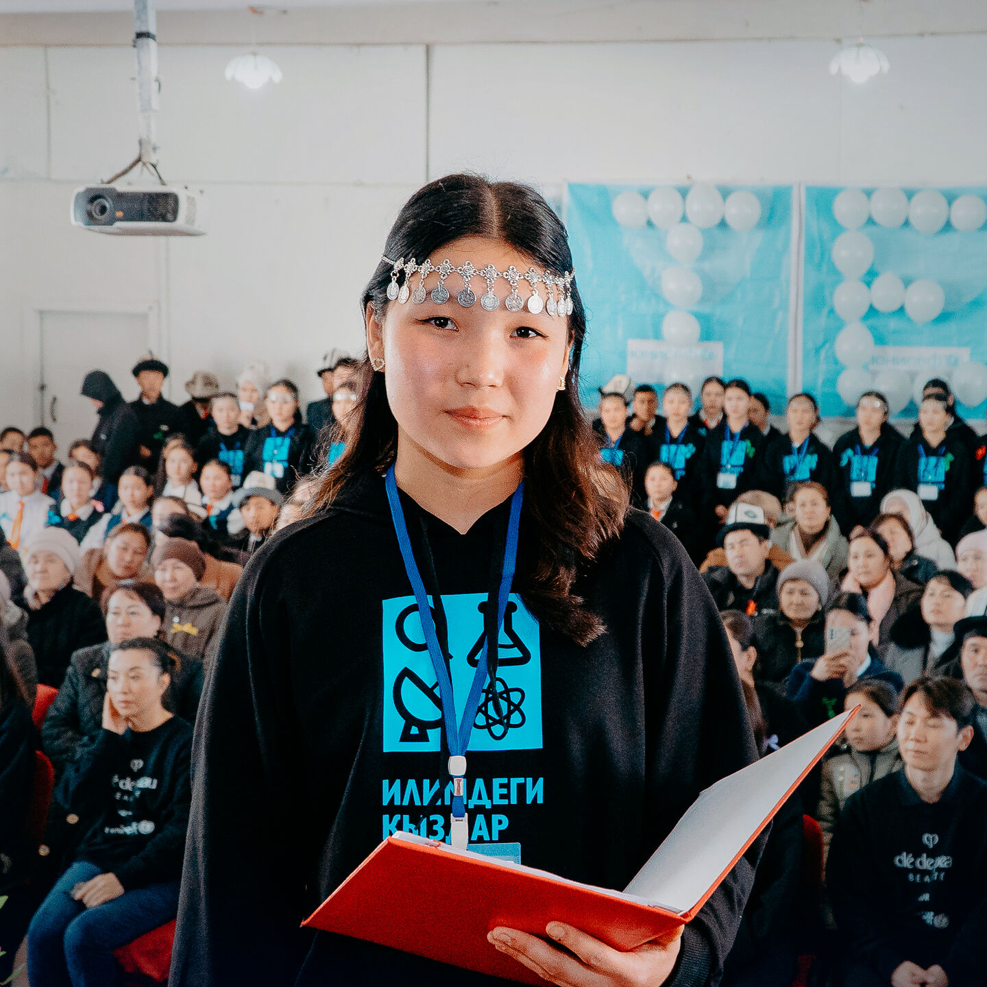 Banner image of a girl from Kyrgyzstan