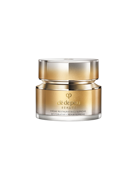 Photo of of a jar of RESTORATIVE CREAM SUPREME
						featuring a metallic gold-to-silver gradient body and a multifaceted
						metallic gold cap. SIZE: 50mL