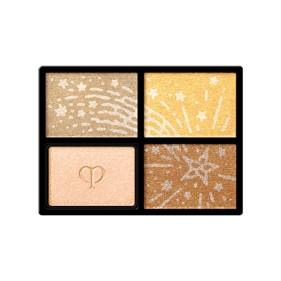 Photo of the 26 AW Holiday Collection limited-edition EYE COLOR QUAD refill. The rectangular black tray contains four rectangular eyeshadow shades. Three shades are detailed with engraved star patterns, and one shade features the embossed brand logo.