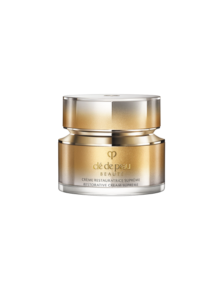 Photo of of a jar of RESTORATIVE CREAM SUPREME
						featuring a metallic gold-to-silver gradient body and a multifaceted
						metallic gold cap. SIZE: 50mL