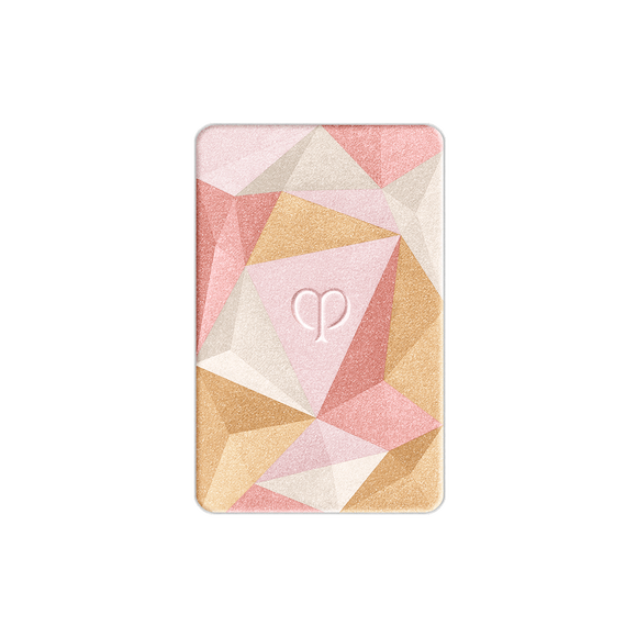 Photo of the 26 AW Holiday Collection limited-edition THE LUMINIZING FACE ENHANCER refill. The geometric multi-colored powder forms a mosaic pattern across the rectangular tray, with the embossed Cl&eacute; de Peau Beaut&eacute; logo centered on a pale pink facet.
