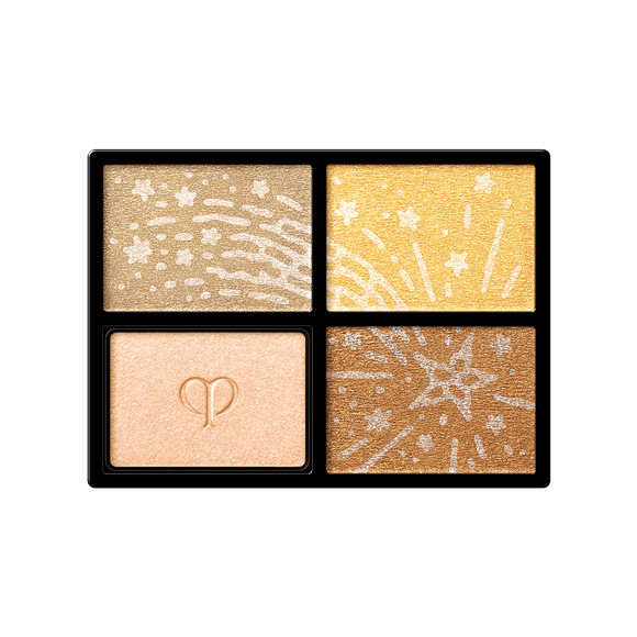 Photo of the 26 AW Holiday Collection limited-edition EYE COLOR QUAD refill. The rectangular black tray contains four rectangular eyeshadow shades. Three shades are detailed with engraved star patterns, and one shade features the embossed brand logo.