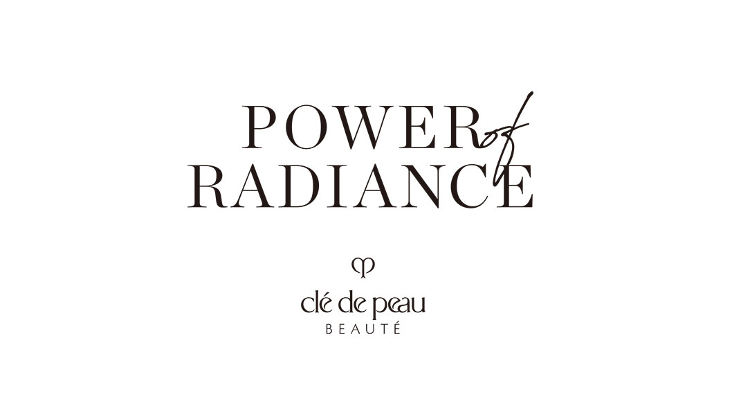 Text logo of "POWER of RADIANCE", with the Clé de Peau Beauté logo below.