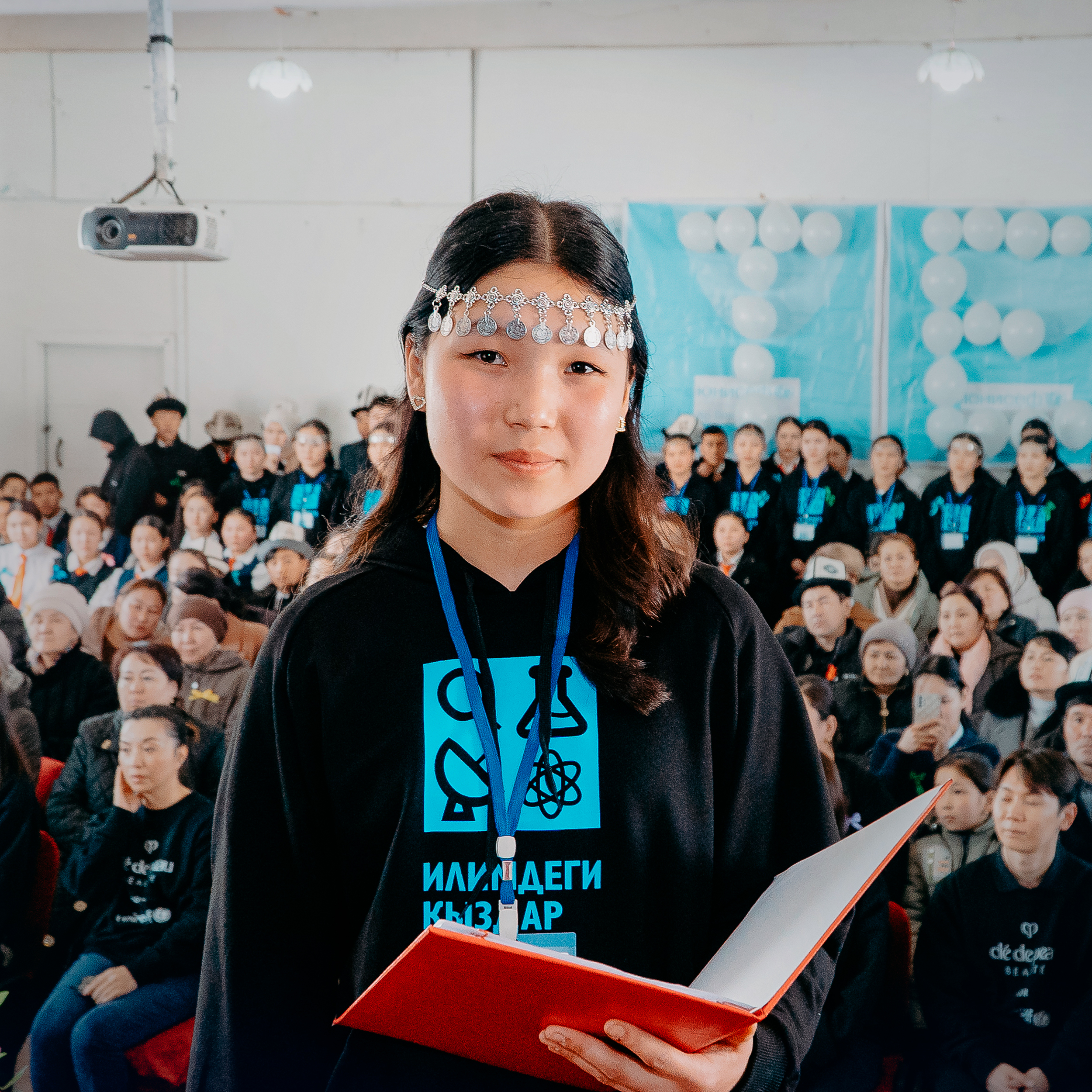Banner image of a girl from Kyrgyzstan